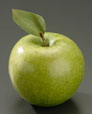 Pomme verte avec feuille